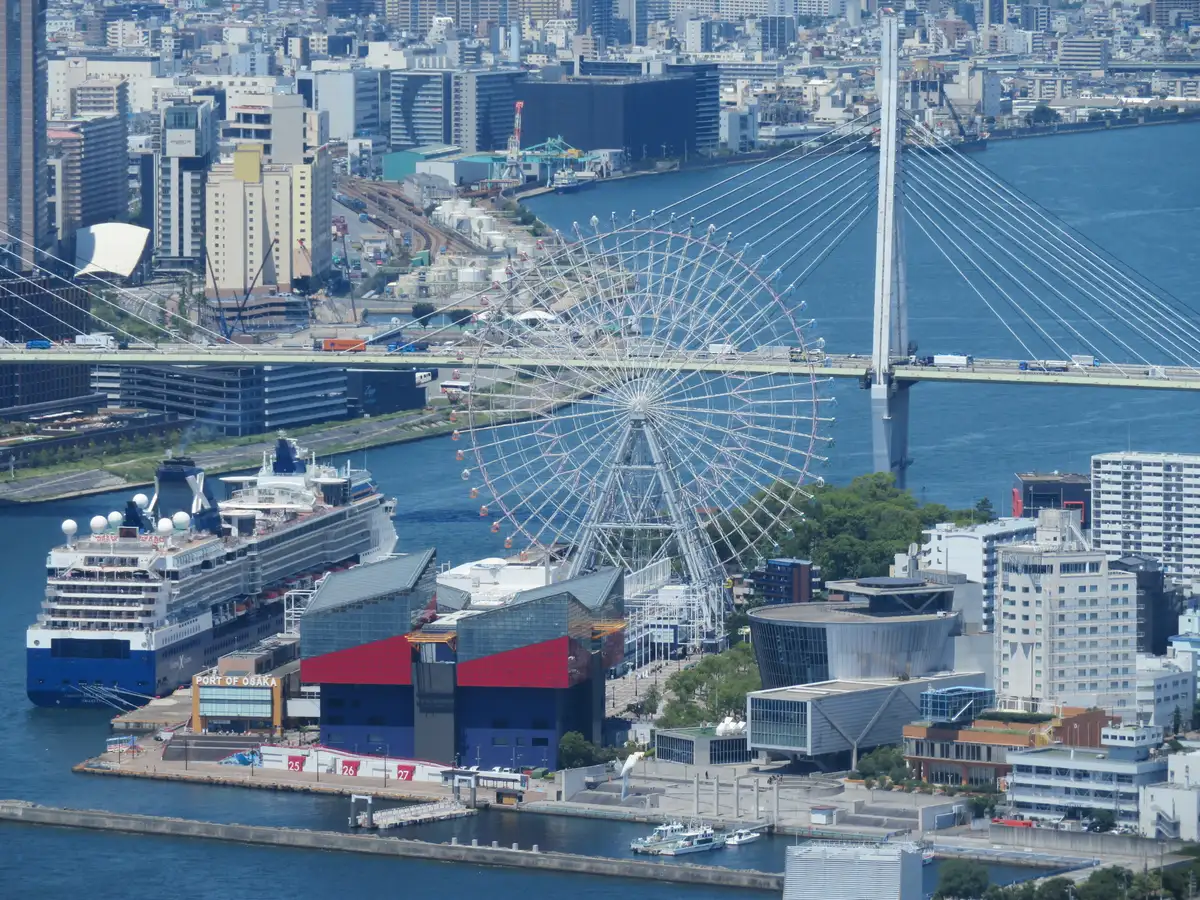 Aerial view of the Tempozan waterfront with the red Ferris wheel and Osaka Aquarium Kaiyukan on Osaka Bay, the aquarium stop on a private Osaka family day tour